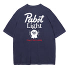 A navy blue short-sleeve t-shirt shown from the back, featuring a large white 'Pabst Light' logo and a red 'Crisp & Refreshing' slogan printed on the back.